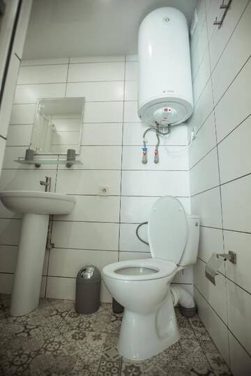 Фото номера Стандартный двухместный номер с 2 отдельными кроватями и видом на сад Отель REEF Hotel г. Коблево 27