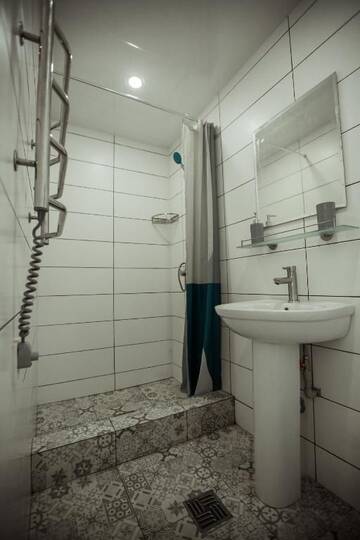 Фото номера Стандартный двухместный номер с 2 отдельными кроватями и видом на сад Отель REEF Hotel г. Коблево 29