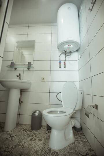 Фото номера Стандартный двухместный номер с 2 отдельными кроватями и видом на сад Отель REEF Hotel г. Коблево 3