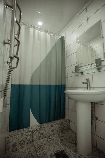 Фото номера Стандартный двухместный номер с 2 отдельными кроватями и видом на сад Отель REEF Hotel г. Коблево 11